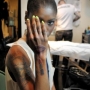 Dicas de tatuagem para pele negra feminina